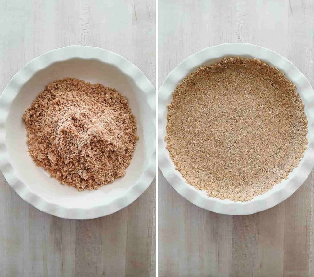 Image showing a pie crust being prepared. Crumbly mixture in a white dish is then pressed into a smooth crust in the dish.