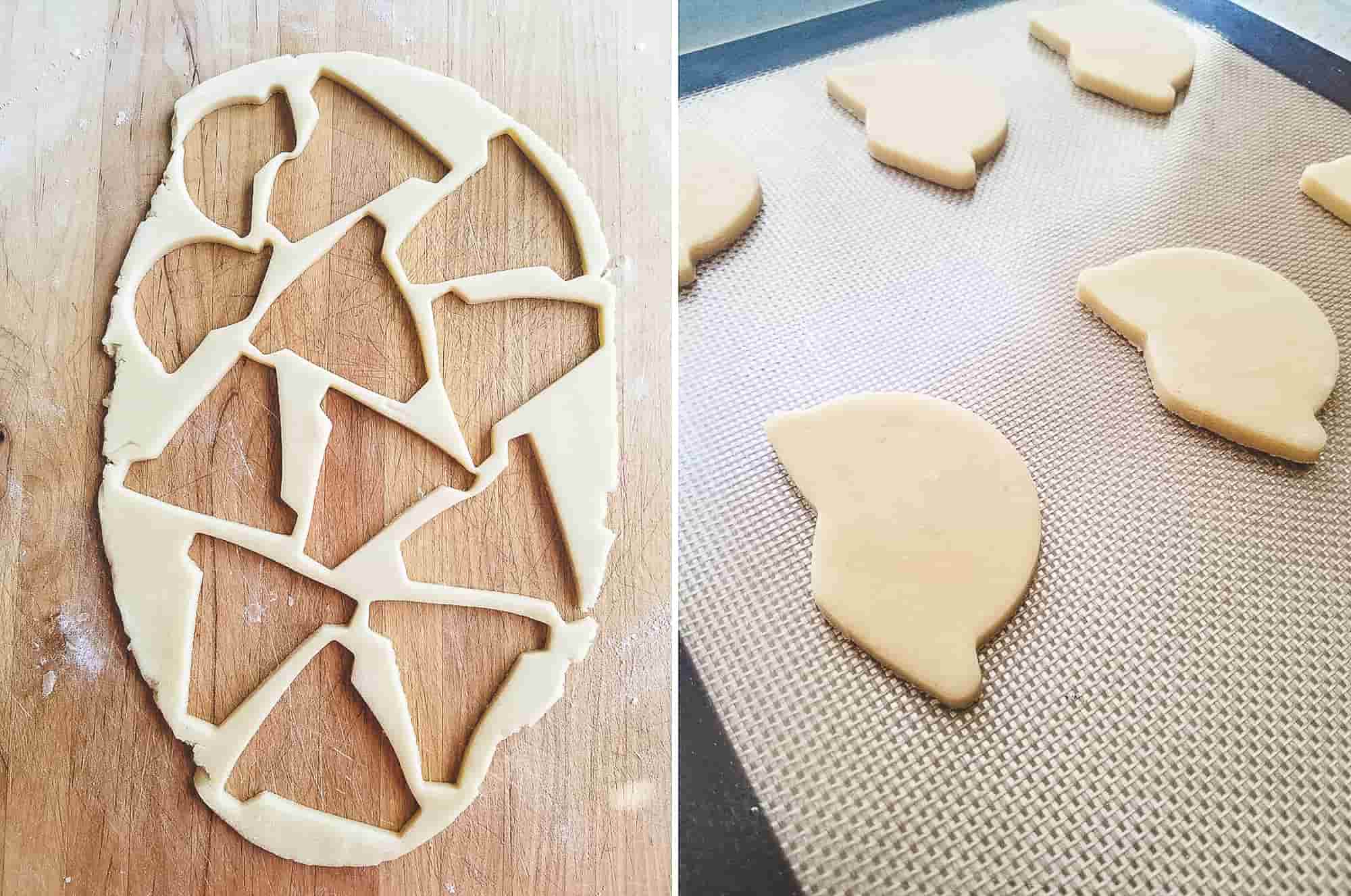 Cookie cutter shapes pressed into sugar cookie dough and the cut-outs arranged on a baking sheet.